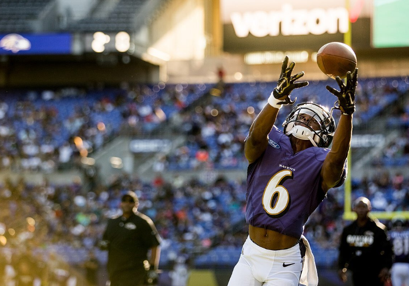 Ravens WR Tim White jumps for the ball.