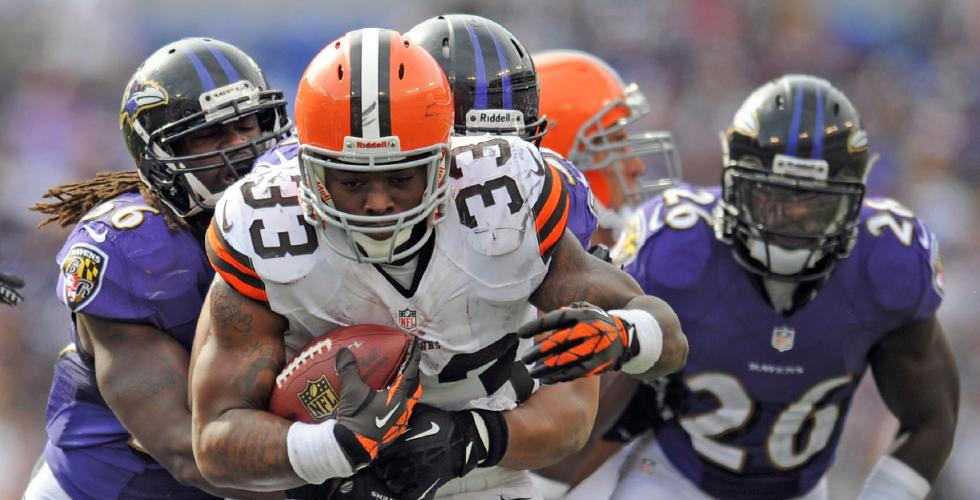Cleveland Browns running back Trent Richardson carries the ball during an NFL football game against the Baltimore Ravens in Baltimore.