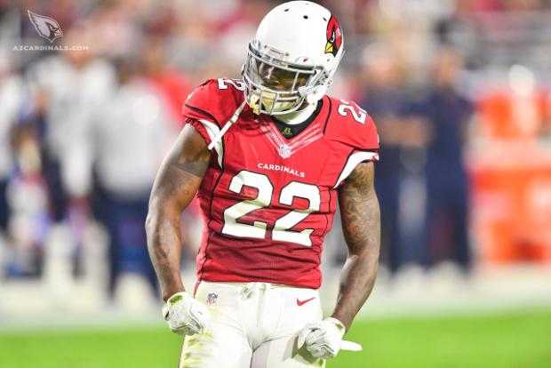 Cardinals S Tony Jefferson flexing wearing his red jersey.