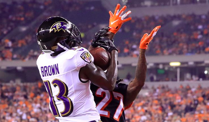 John Brown hauls in a TD over the Bengals defender.