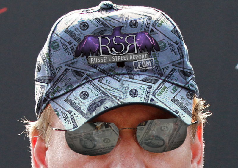 Roger Goodell wearing a hat with $100 bills on it