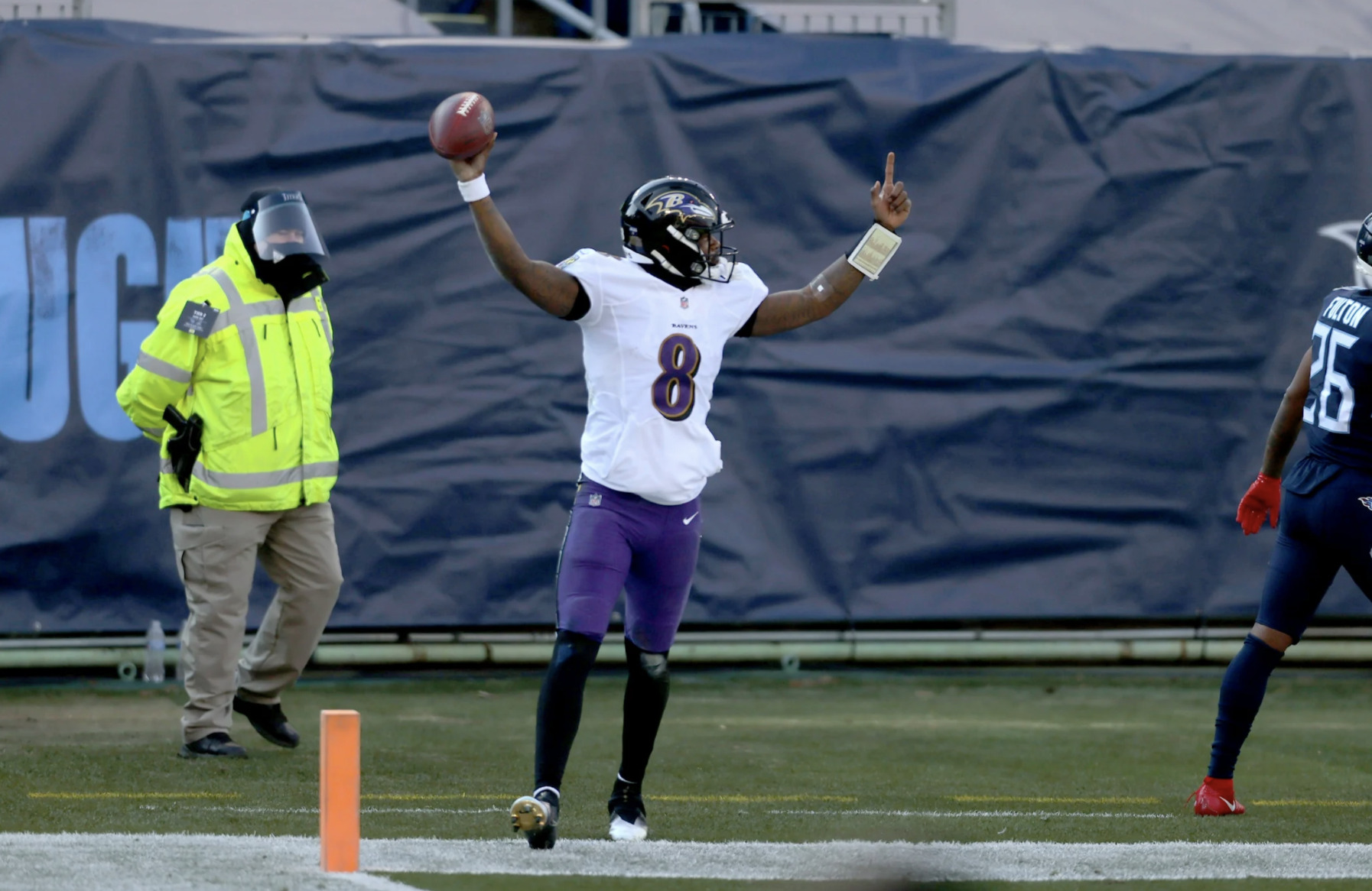 Lamar Jackson celebrates in the end zone in Tennessee against the Titans