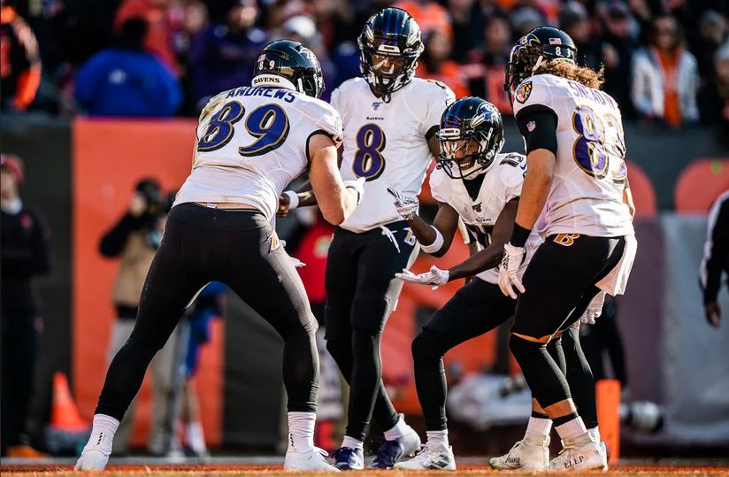 Mark Andrews, Willie Snead, Lamar Jackson, & Hollywood Brown celebrate in the end zone.