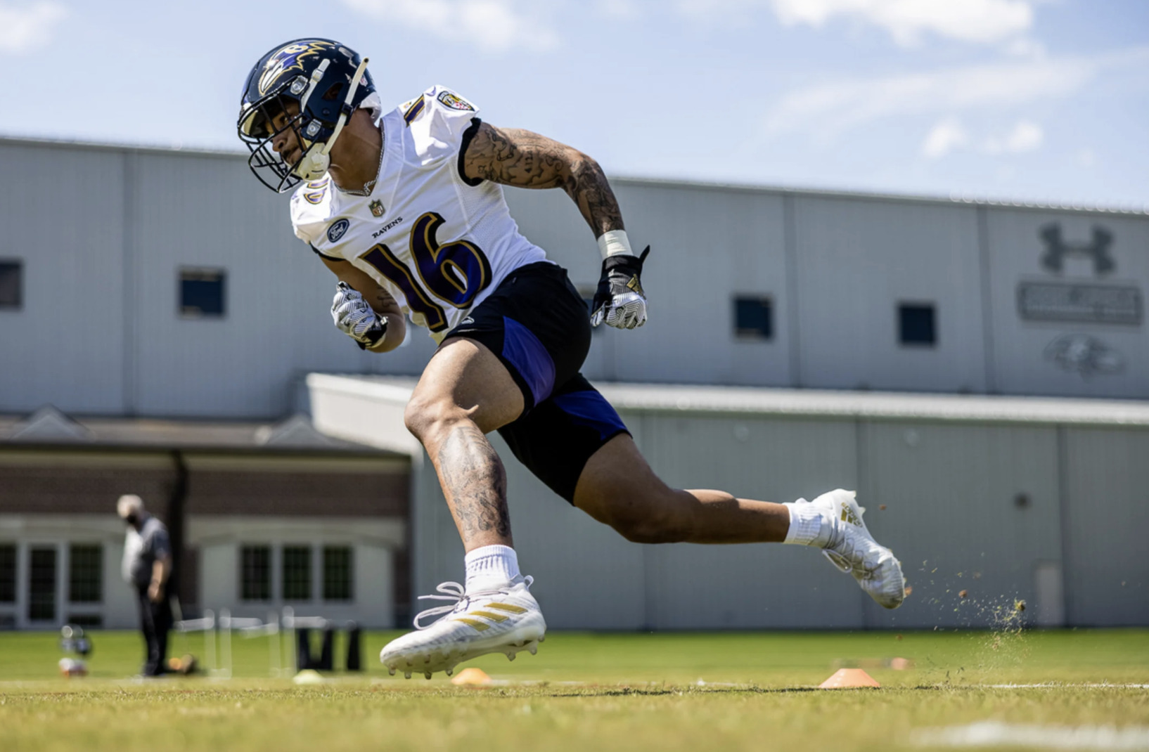 Tylan Wallace participates in drills at OTA