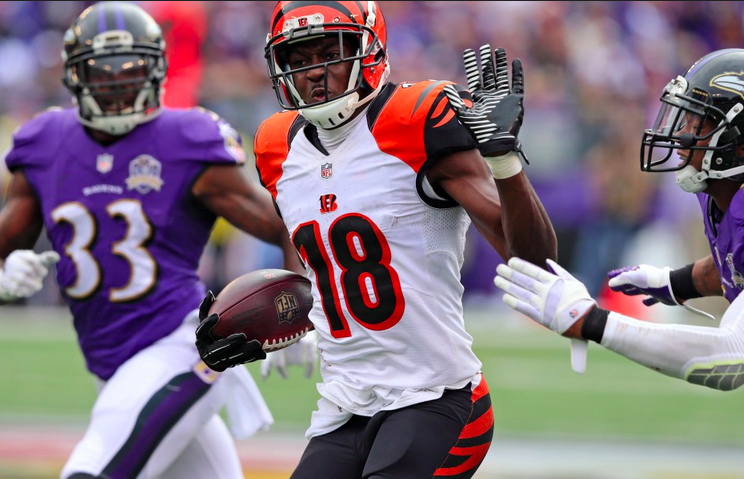 A.J. Green giving a stiff arm while torching the Ravens secondary for a touchdown.