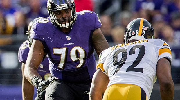 Ronnie Stanley of the Ravens lines up against James Harrison of Pittsburgh.