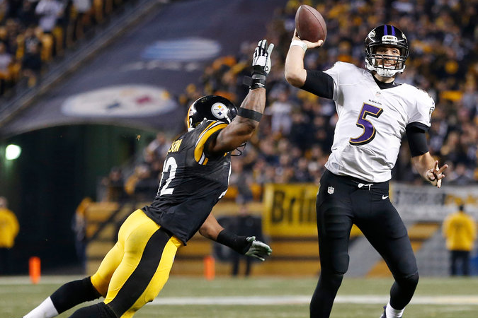 Joe Flacco evades a James Harrison sack in no huddle offense for a touchdown