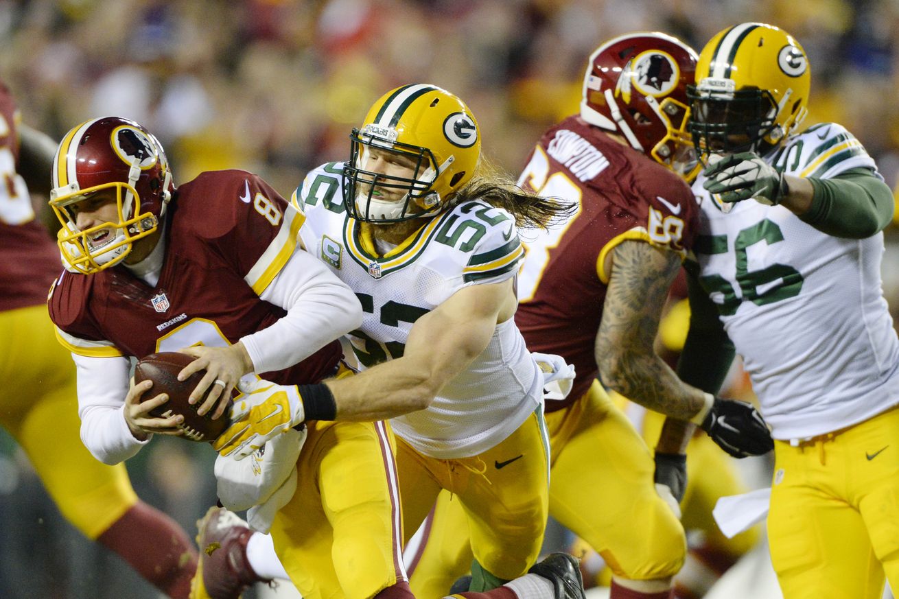 Packers LB Clay Matthews sacks Redskins QB Kirk Cousins in their Wild Card matchup on January 10, 2016.